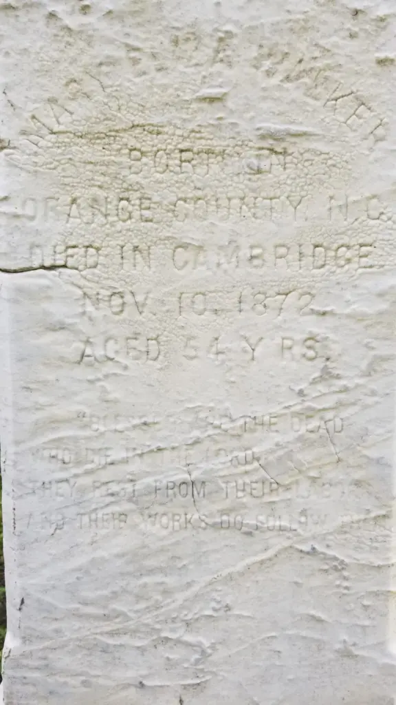 A close-up photograph of a gravestone inscription