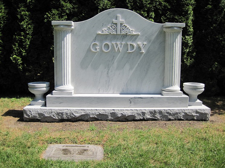 A marble gravestone reading "Gowdy"