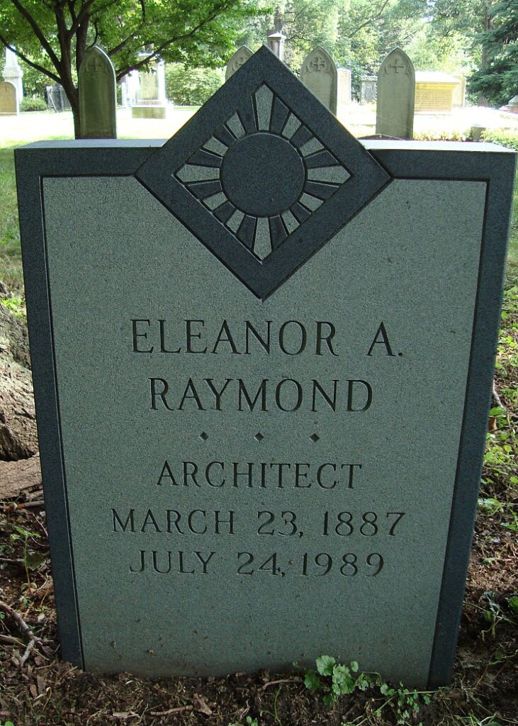 A slate and granite gravestone in a cemetery