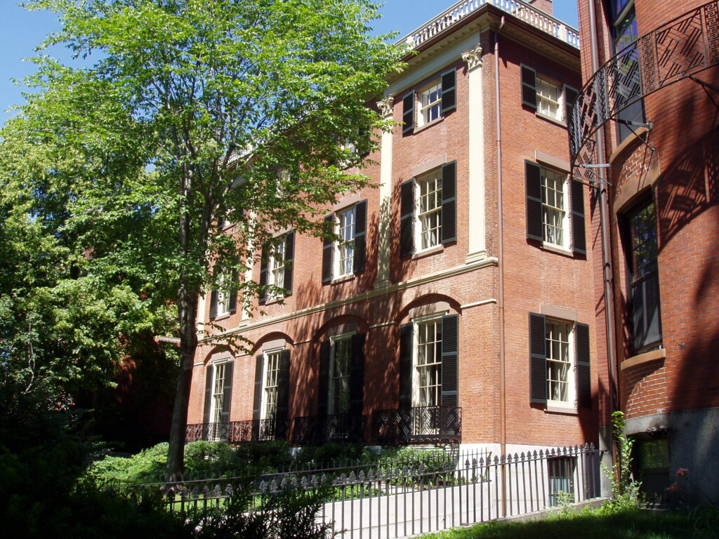 A photo of a historic brownstone house. 