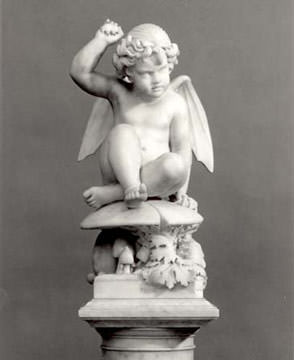 a neoclassical sculpture of a cherub. 