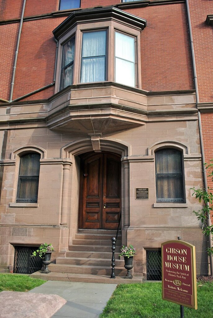 A photograph of a brownstone building