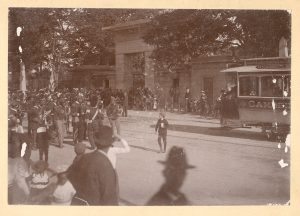 Visitors gathered in front of Mount Auburn's Egyptian Revival Gateway, ca. 1870 - 1900 cabinet card.